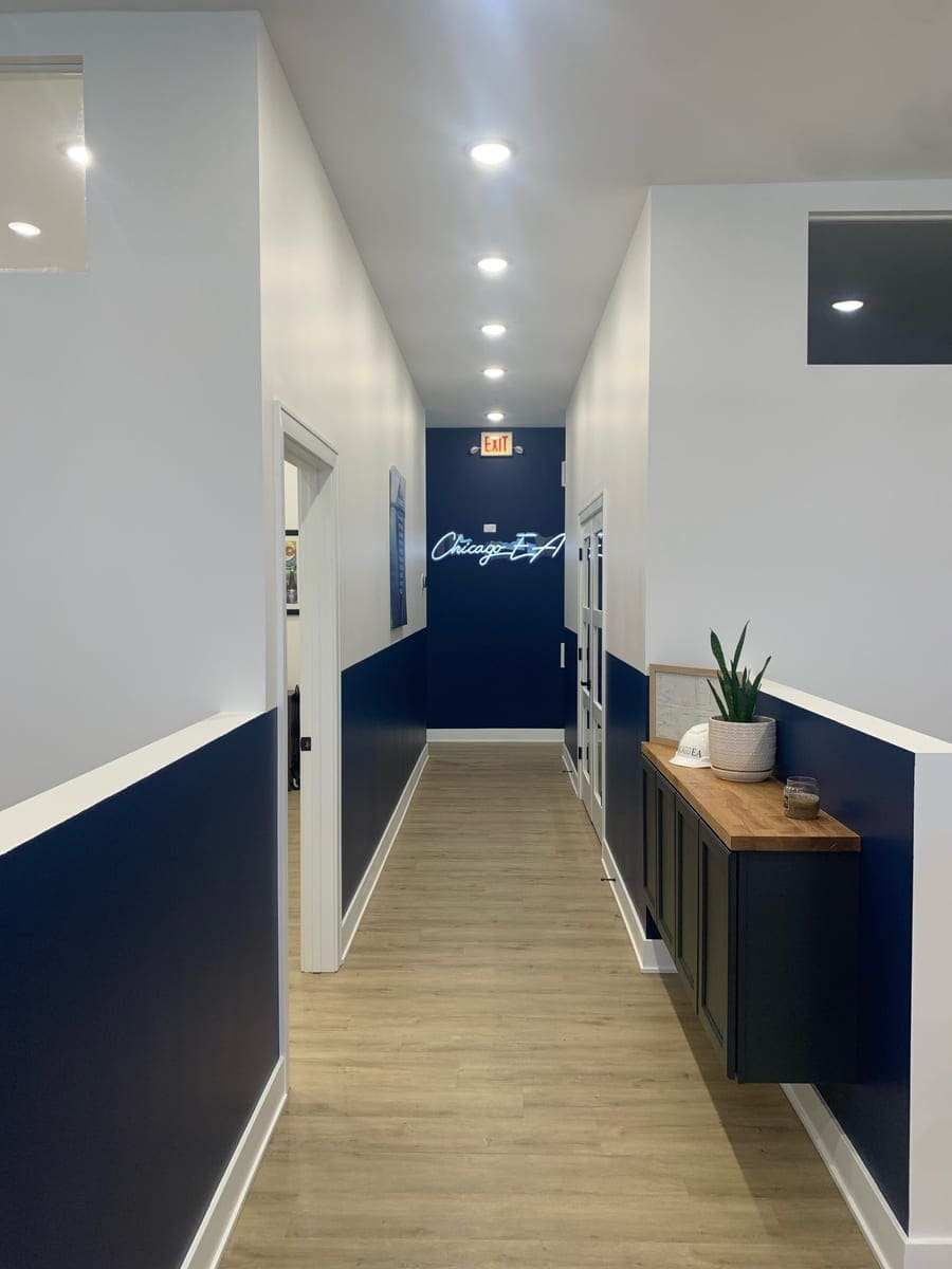 Chicago EA office hallway with neon signage